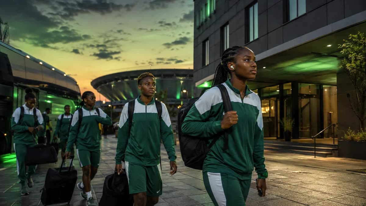 AI editorial scene of non-identifiable Nigerian under-20 women footballers arriving near a stadium in Katowice