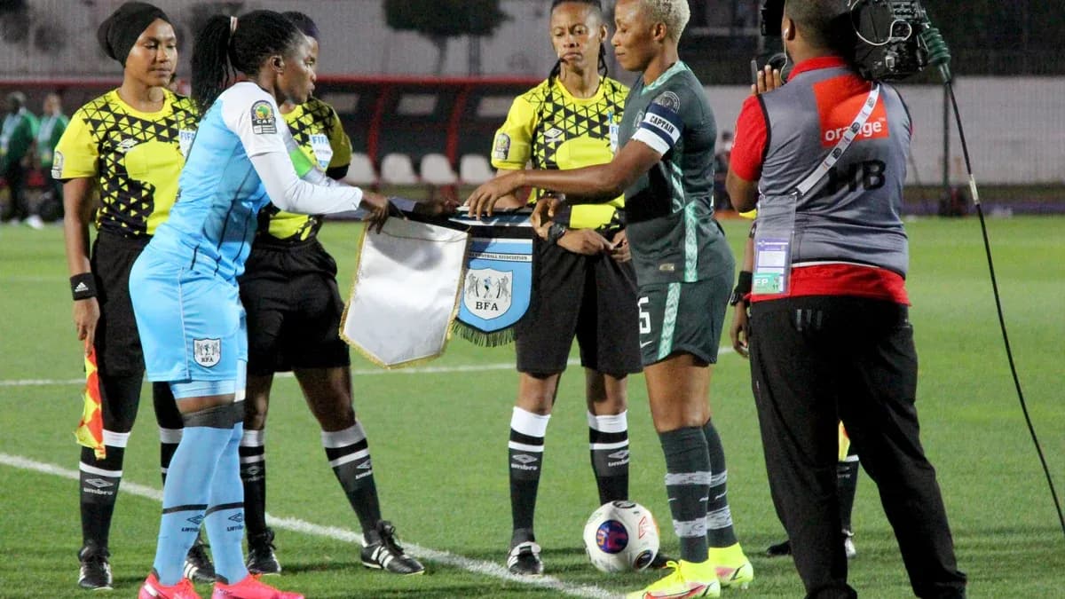 Archive: Nigeria and Botswana captains exchange pennants at WAFCON in 2022.