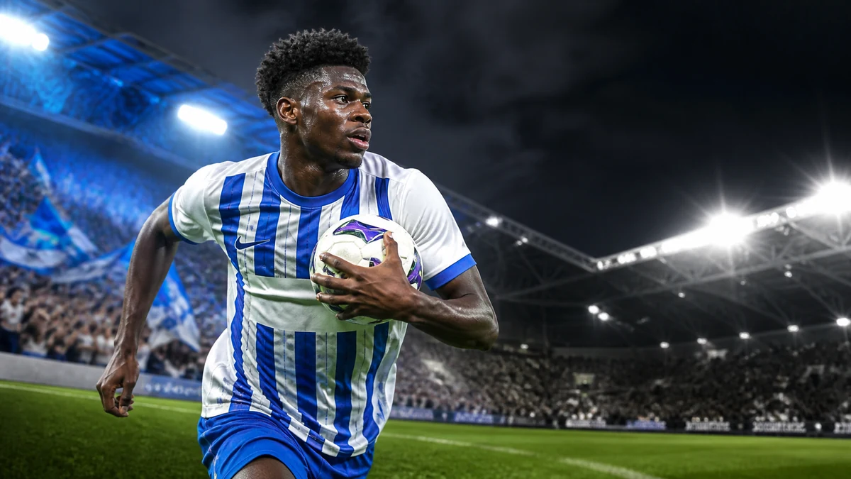 Carlos Baleba carrying the ball between Brighton blue and Newcastle black-white stadium light